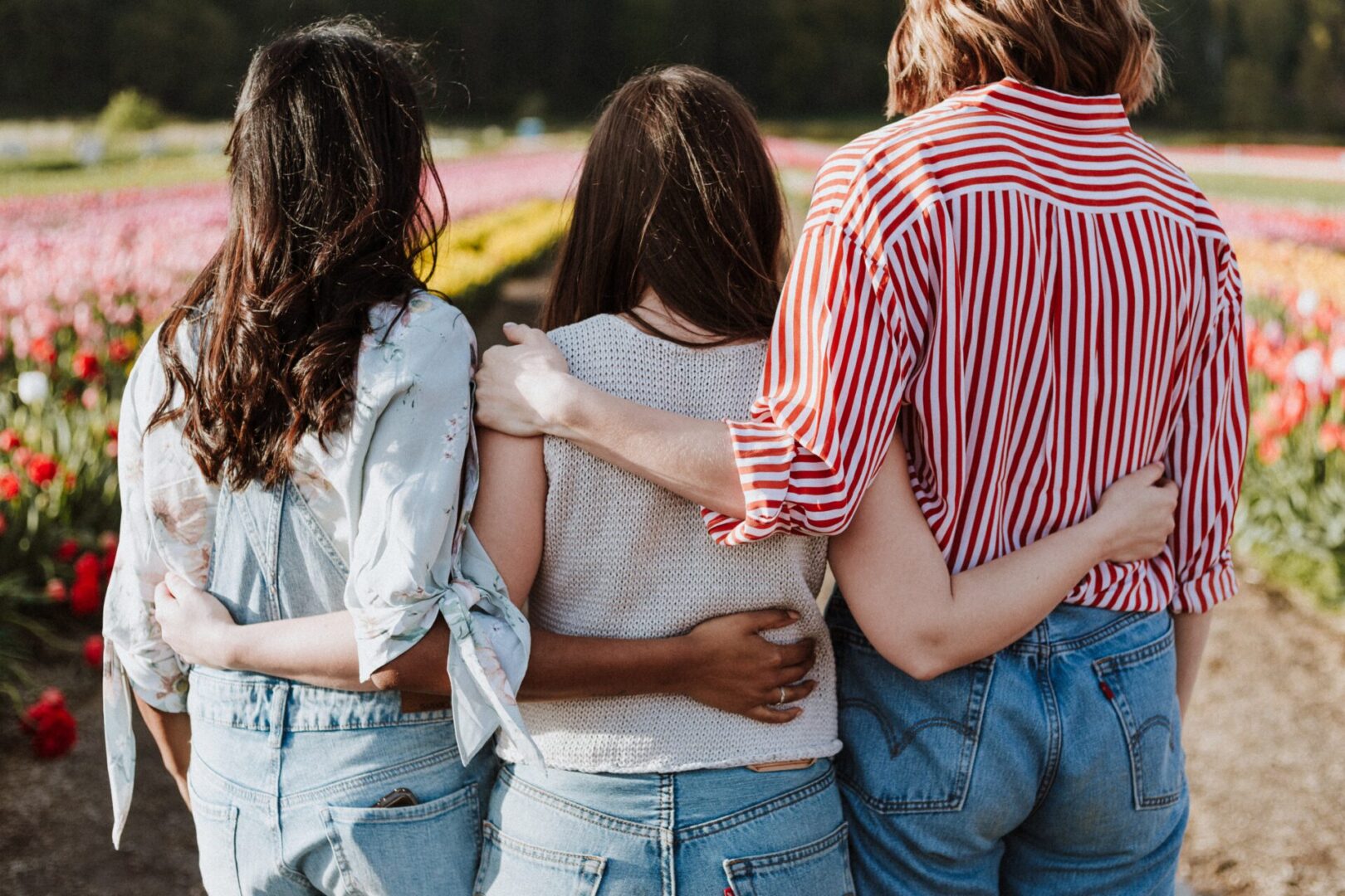 A group of people standing next to each other.