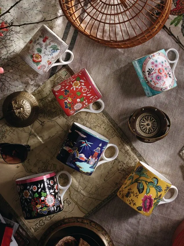 A group of mugs sitting on top of a table.